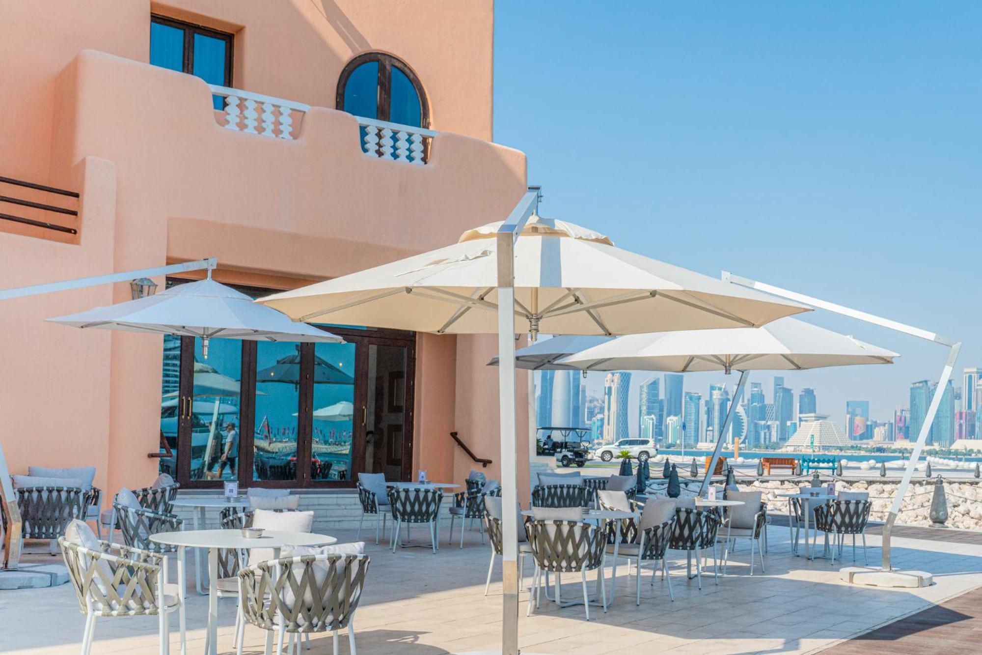 Mina Hotel And Residences By The Torch 도하 외부 사진 A patio umbrella