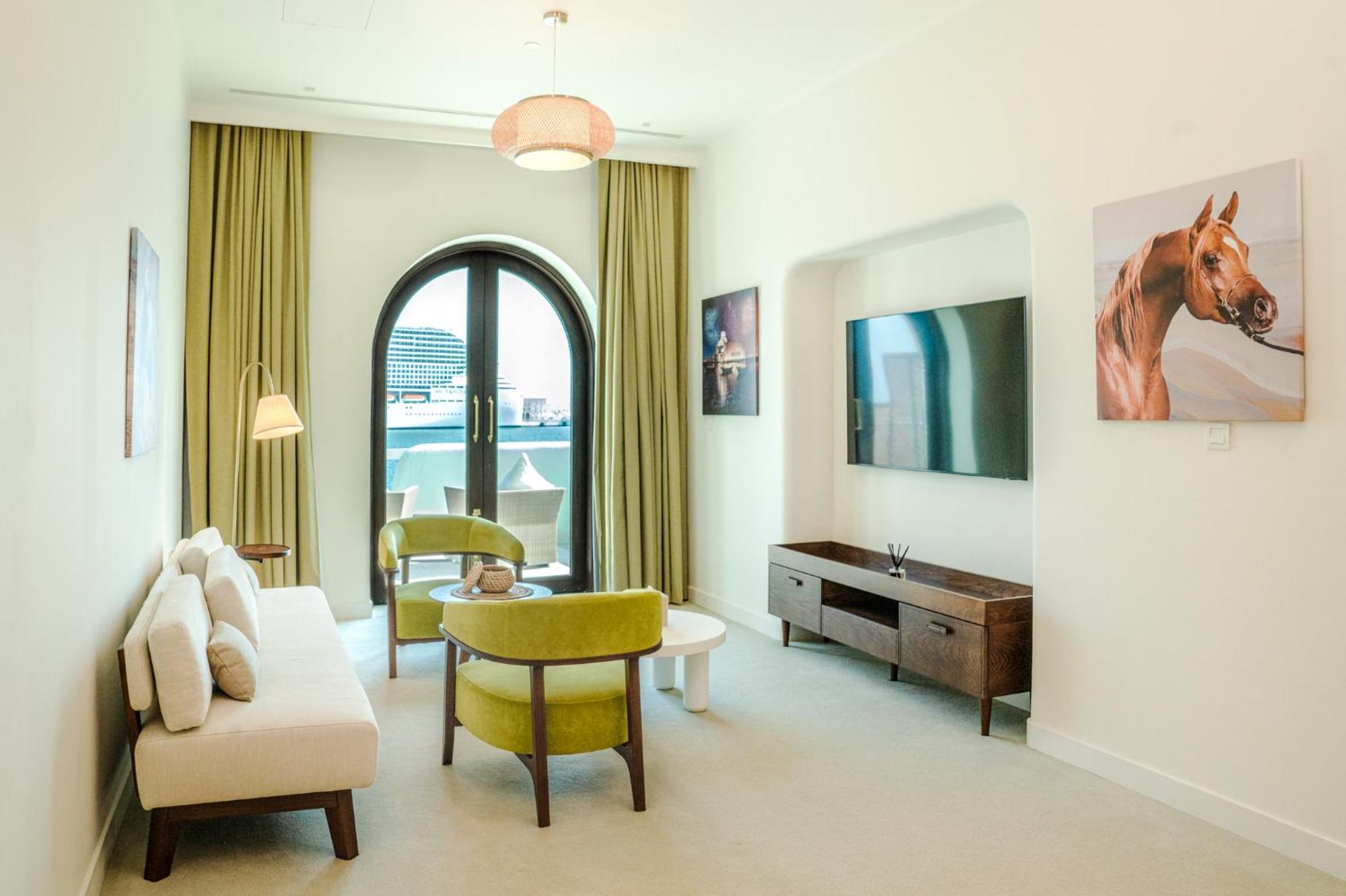Mina Hotel And Residences By The Torch 도하 외부 사진 A living room at the hotel