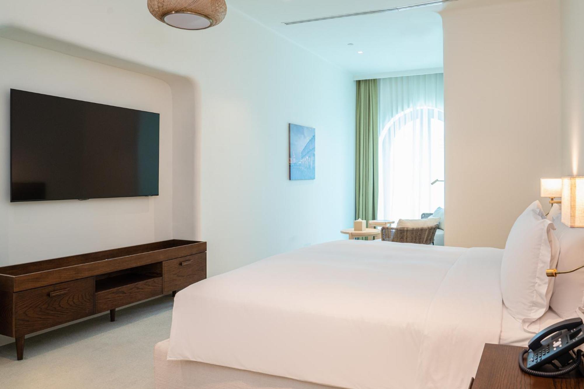 Mina Hotel And Residences By The Torch 도하 외부 사진 A bedroom at the hotel