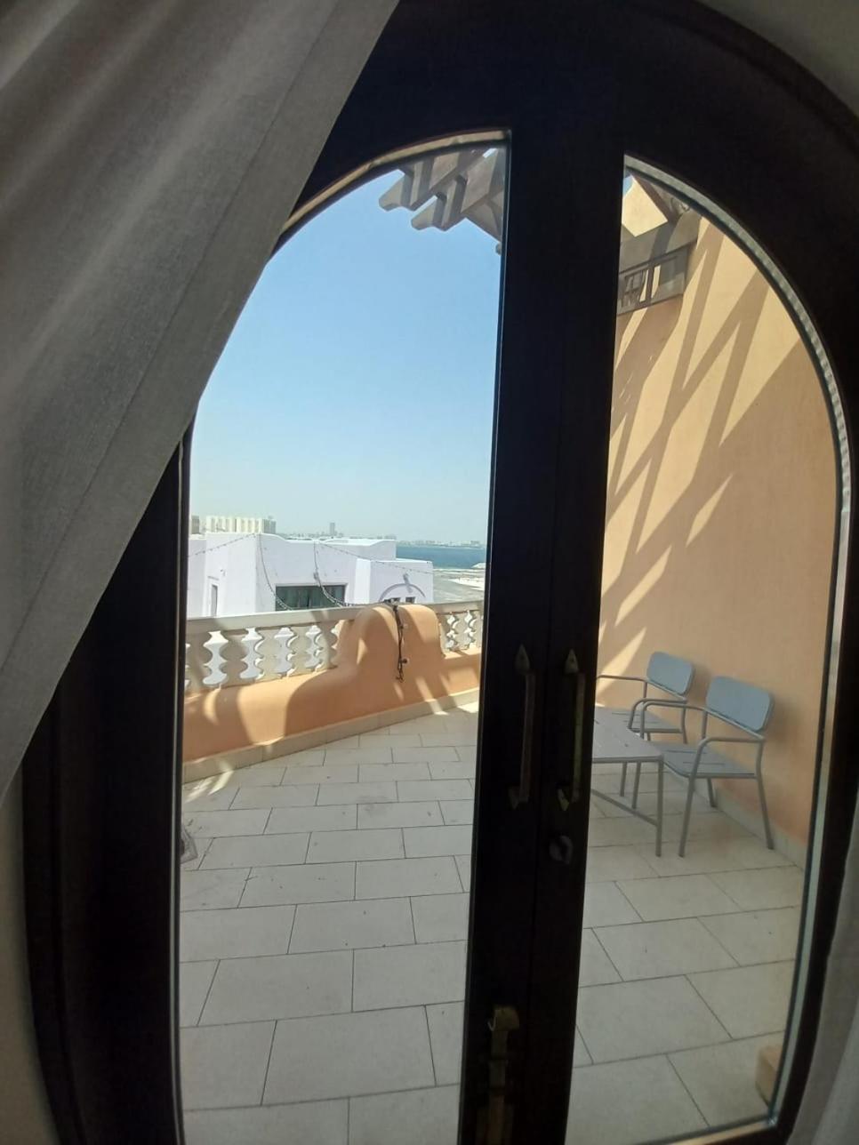 Mina Hotel And Residences By The Torch 도하 외부 사진 A view from the balcony of a suite at the hotel